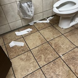 Bathroom stall trashed by customers! But who's going to clean it! No one cuz then I went the next day it was still the same!