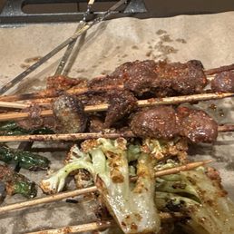 Chicken gizzards, cauliflower skewers