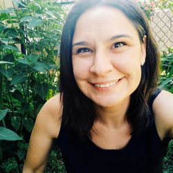 Positive Coach Rachel smiling outdoors