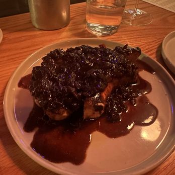 Claud - Pork chop with smoked onion au jus - Wine Bars Near Me - New York, New York Claud - Pork chop with smoked onion au jus - Wine Bars Near Me - New York, New York