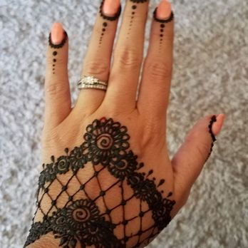 Allure Salon - Henna tattoo with the paste still on just after the appointment - Hair Salons Near Me - Aurora, Illinois