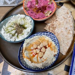 Qurtubah - Appetizer trio of hummus with homemade bread