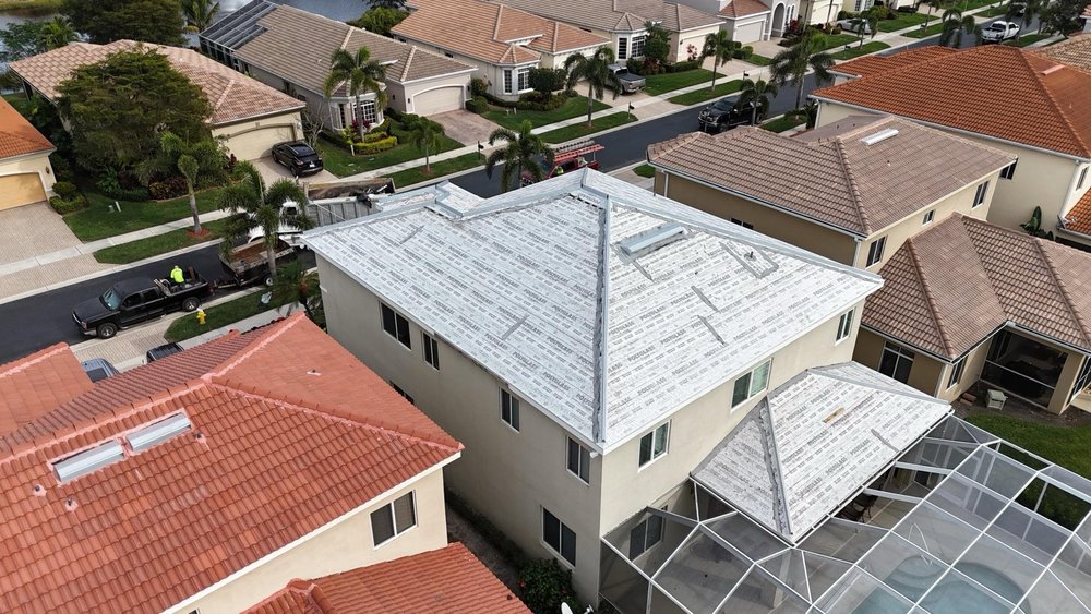 Slide of Prestige Roofing Company