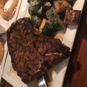 Briquettes Steakhouse - T bone and zucchini - Steakhouses Near Me - Mobile, Alabama