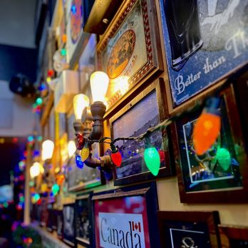 Kelly's Pub - a wall full of pictures and lights - Pubs Near Me - Edmonton, Alberta Kelly's Pub - a wall full of pictures and lights - Pubs Near Me - Edmonton, Alberta