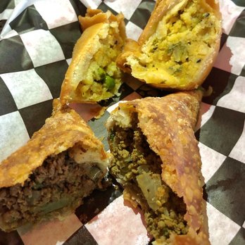 Golden Fingers - Samosas - meat in front, vegetarian one in the back. Opened it up so you could see what was inside! - Mediterranean Near Me - Minneapolis, Minnesota
