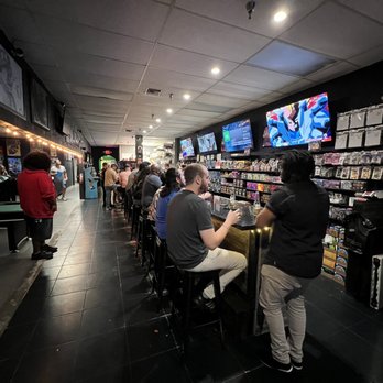 Game Night - people sitting at tables in a game room - Bars Near Me - Coral Springs, Florida Game Night - people sitting at tables in a game room - Bars Near Me - Coral Springs, Florida