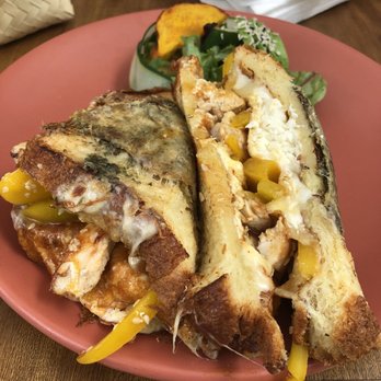 Ojo de Agua - Grilled chicken sandwich with manchego cheese, yellow bell peppers & mango chutney. - Mexican Near Me - Miami, Florida