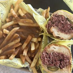 Left: wet fries with gravy ($6.75). Right: pastrami dip ($12.60) Left: wet fries with gravy ($6.75). Right: pastrami dip ($12.60)