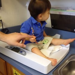 Stanford Medicine Childrens Health - Ian J., future Yelper, getting weighed prior to his consultation with his pediatrician Dr. Toby Hays. 4/15/14
