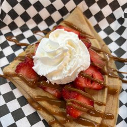 Pure Vibes Nutrition - Crepe with strawberries and dulce de leche.