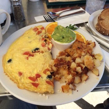 Snug Harbor - Omelette with greasy salty potatoes - Diners Near Me - Santa Monica, California