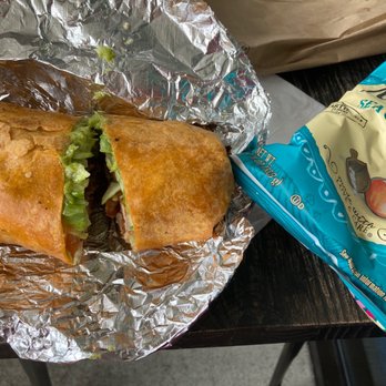 Seaside Bagels - Kure Beach on a sun dried tomato wrap. - Bagels Near Me - Wilmington, North Carolina Seaside Bagels - Kure Beach on a sun dried tomato wrap. - Bagels Near Me - Wilmington, North Carolina