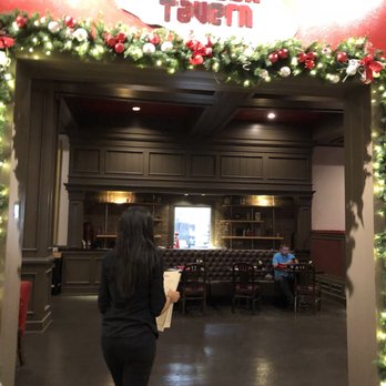 Crimson Tavern - Entrance is hidden to the left of the Marriott entrance by the coffee bean and tea leaf - Gastropubs Near Me - Orlando, Florida Crimson Tavern - Entrance is hidden to the left of the Marriott entrance by the coffee bean and tea leaf - Gastropubs Near Me - Orlando, Florida