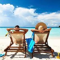 Travel Leaders - A1 Travel - Relaxing at the beach