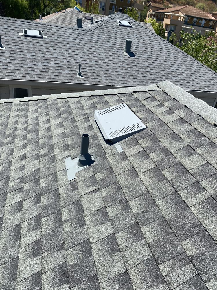 Slide of Tip Top Roofing