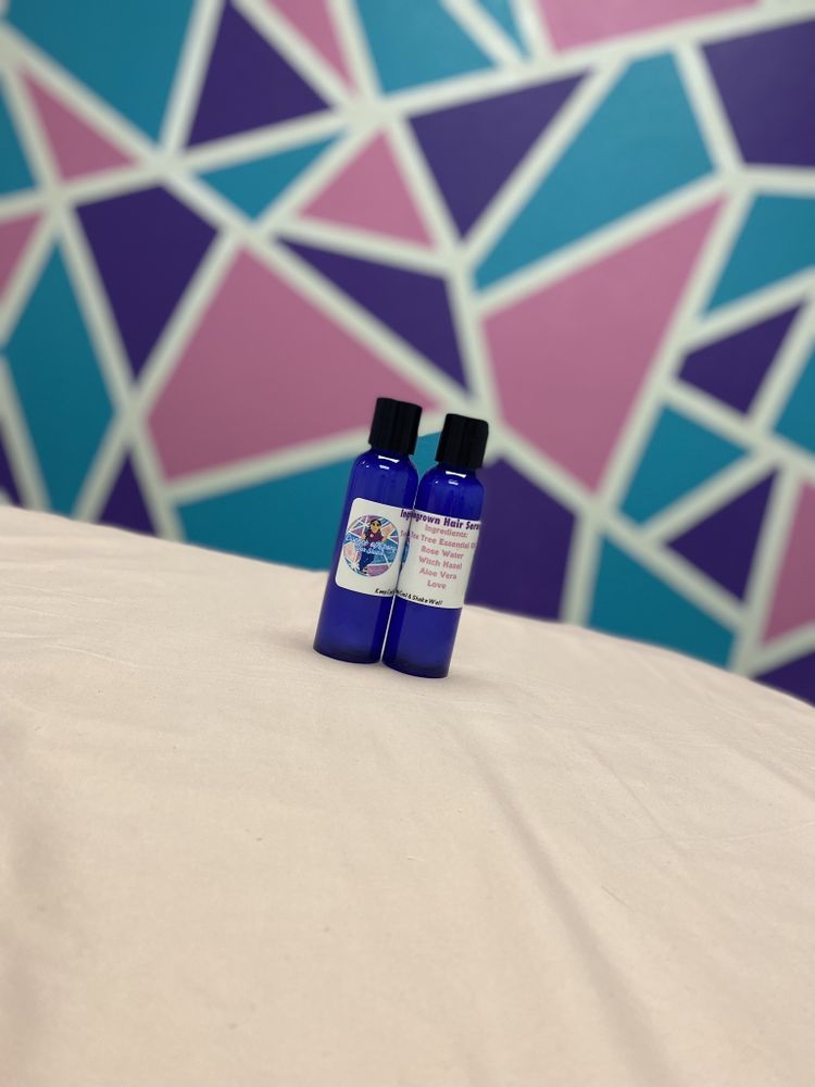 Essence of Ebony Wax Studio Logo