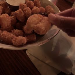 a plate of fried chicken nuggies a plate of fried chicken nuggies