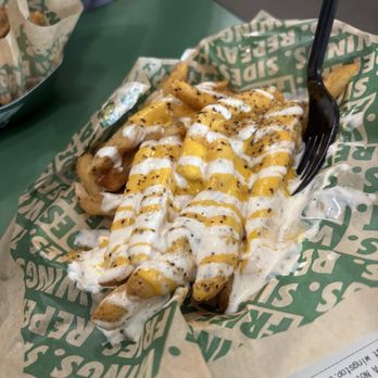 Wingstop - Lemon pepper voo doo fries - Chicken Wings Near Me - Pico Rivera, California Wingstop - Lemon pepper voo doo fries - Chicken Wings Near Me - Pico Rivera, California
