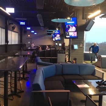 Topgolf - Some bays have couches! Other just have high-too tables. Make a request for what you want. - Golf Near Me - Mount Laurel, New Jersey