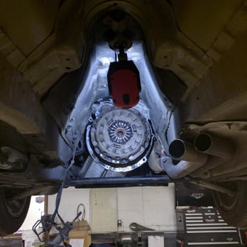 Midwest Towing & Auto Repair - This worn clutch off a 2000 BMW 325i is ready for removal after taking down the transmission. - Towing Near Me - Shakopee, Minnesota Midwest Towing & Auto Repair - This worn clutch off a 2000 BMW 325i is ready for removal after taking down the transmission. - Towing Near Me - Shakopee, Minnesota