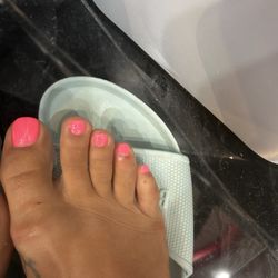 Mailisa Nail Spa - Look at the fourth toe... she buffed my skin off, then doused in alcohol when she saw blood.
