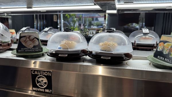 Kura Revolving Sushi Bar by null