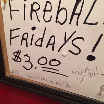 Newark Nook - a fireball fridays sign on a bulletin board - Sports Bars Near Me - Chicago, Illinois