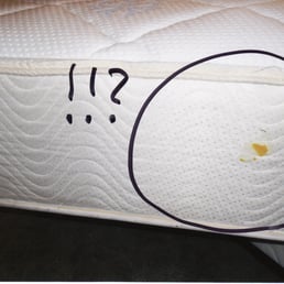 Disgusting looking stain (egg yolk?) on mattress delivered to my home by Holbrook's when I ordered a new mattress. Disgusting looking stain (egg yolk?) on mattress delivered to my home by Holbrook's when I ordered a new mattress.
