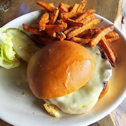 Raizes - Burger with sweet potato fries. Really good burger with a lot of cheese. Crispy fries.
