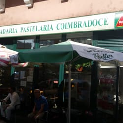 Padaria Pastelaria Coimbradoce - This is a nice local cafe. Wifi,  nice service and the place to get a port and an espresso before you enjoy furer of Coimbra.