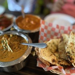 Indian Delicacy - The garlic naan, butter chicken , methi chicken , Chilly chicken.