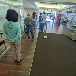 Bank of America Financial Center - Insane line in on a Monday afternoon.  The host needs to tell people to use the machines instead of telling everyone to line up....