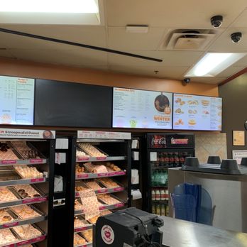 Dunkin' -  a display of donuts in a store - Donuts Near Me - Pleasant View, Tennessee