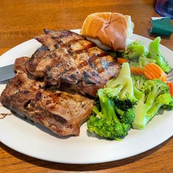 Creekside Restaurant - Best pork chops I've ever had.  They are consistently juicy and delicious.