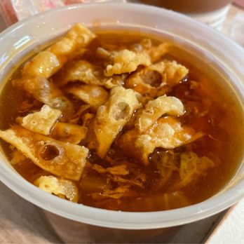 NY Chinese - a bowl of soup on a table - Chinese Near Me - Clermont, Florida