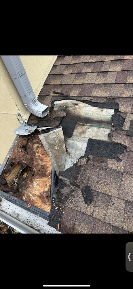 Slide of Redeemer Roofing