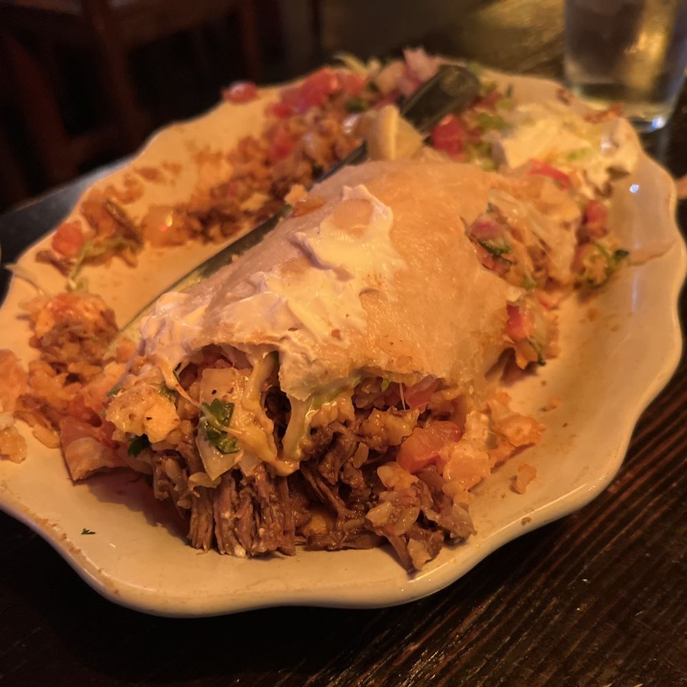 Laredo's Grill - a plate of food on a table - Tex-Mex Near Me - Seattle, Washington Laredo's Grill - a plate of food on a table - Tex-Mex Near Me - Seattle, Washington
