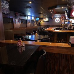 Grandstand Bar and Grille - Sit at a booth and enjoy.