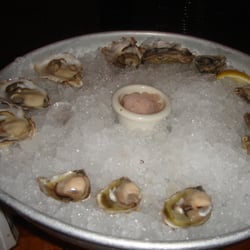 Dozen small oysters
