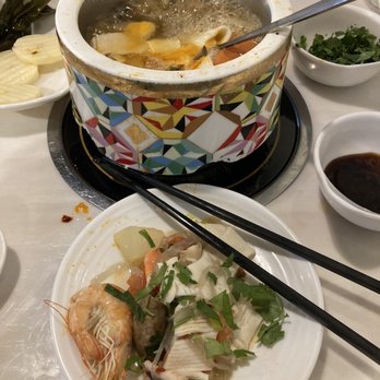 Homey Hot Pot & Sushi - Traditional style is to dip and cook the items in the broth, and eat them outside of the broth after they're done cooking. Tons of flavor! - Hot Pot Near Me - Bloomington, Indiana Homey Hot Pot & Sushi - Traditional style is to dip and cook the items in the broth, and eat them outside of the broth after they're done cooking. Tons of flavor! - Hot Pot Near Me - Bloomington, Indiana