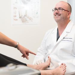 Southwest Austin Foot & Ankle Clinic - Dr. Whitesides treating a patient