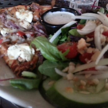 Kona Brewing - Slice of Wild Mushroom Pizza and Mixed green salad. - Pubs Near Me - Honolulu, Hawaii Kona Brewing - Slice of Wild Mushroom Pizza and Mixed green salad. - Pubs Near Me - Honolulu, Hawaii