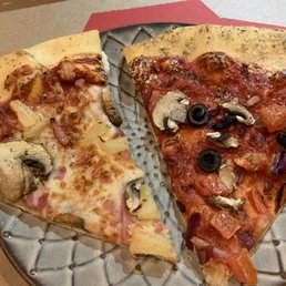 two slices of pizza on a plate two slices of pizza on a plate