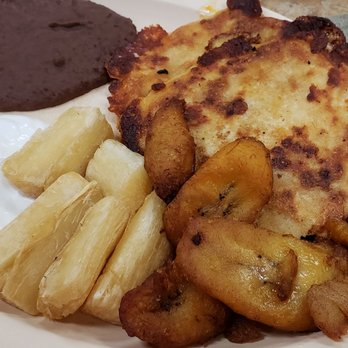 Taco Real - El Salvador's country dish: 2 papusas, 1 fried plantain, cassava, refried beans and sour cream - Mexican Near Me - Carol Stream, Illinois