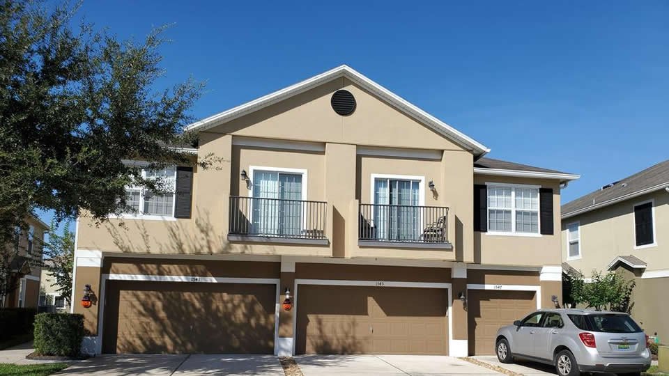 Slide of New Port Richey Roofing Pros