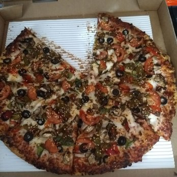 Upper Crust Pizza - This is is the veggie it is good and and made well. love the sesame seeds it's a good touch to the average Pizza. The green chile is hot. - Pizza Near Me - Santa Fe, New Mexico
