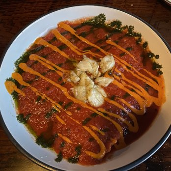 The Paper Canoe - Ravioli topped with blue crab with tomato basil sauce - Seafood Near Me - Duck, North Carolina