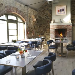 The Duck - Main dining area with fireplace at The Duck