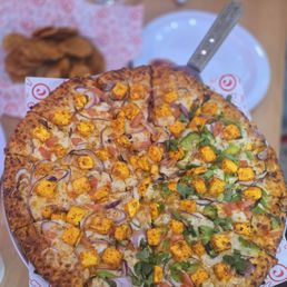 Half Chili Paneer and Half Butter Paneer Pizza Half Chili Paneer and Half Butter Paneer Pizza